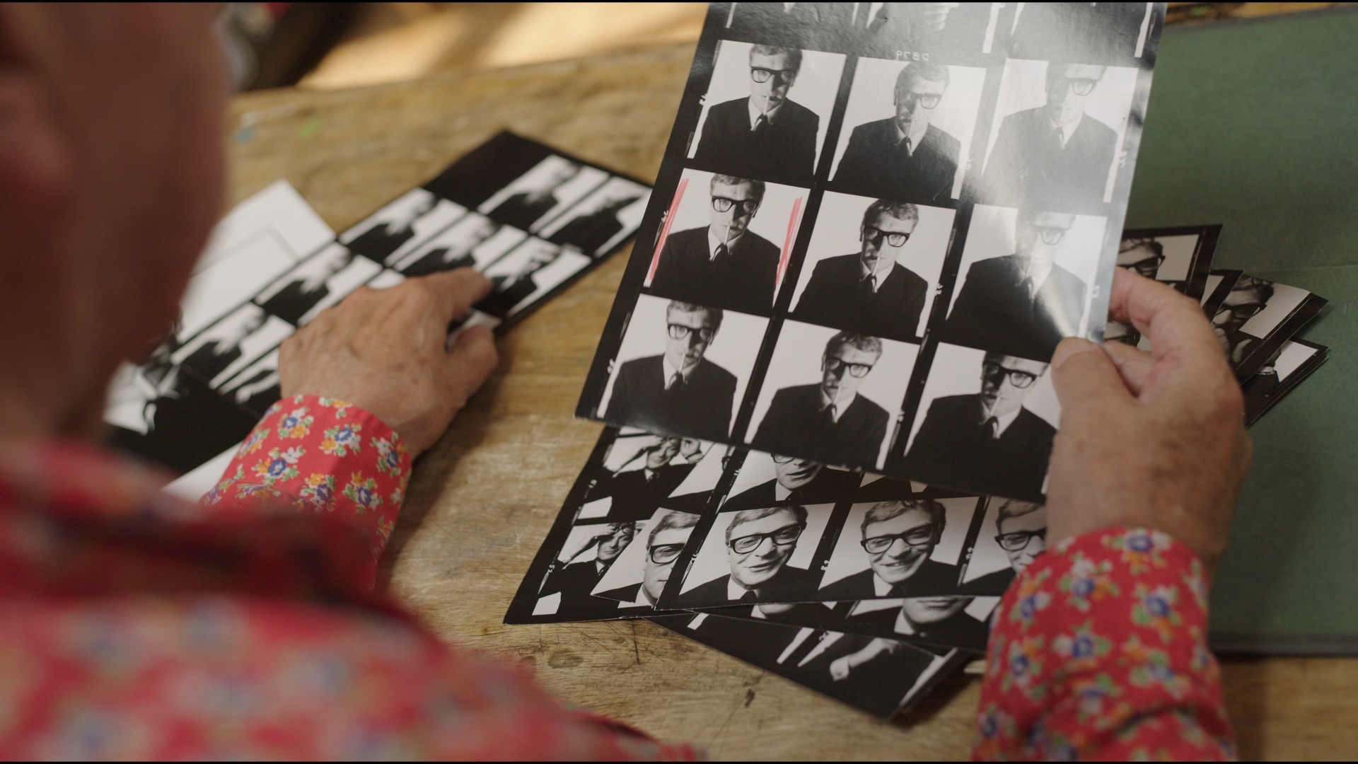 MCAINE: An Anagram of Cinema Background