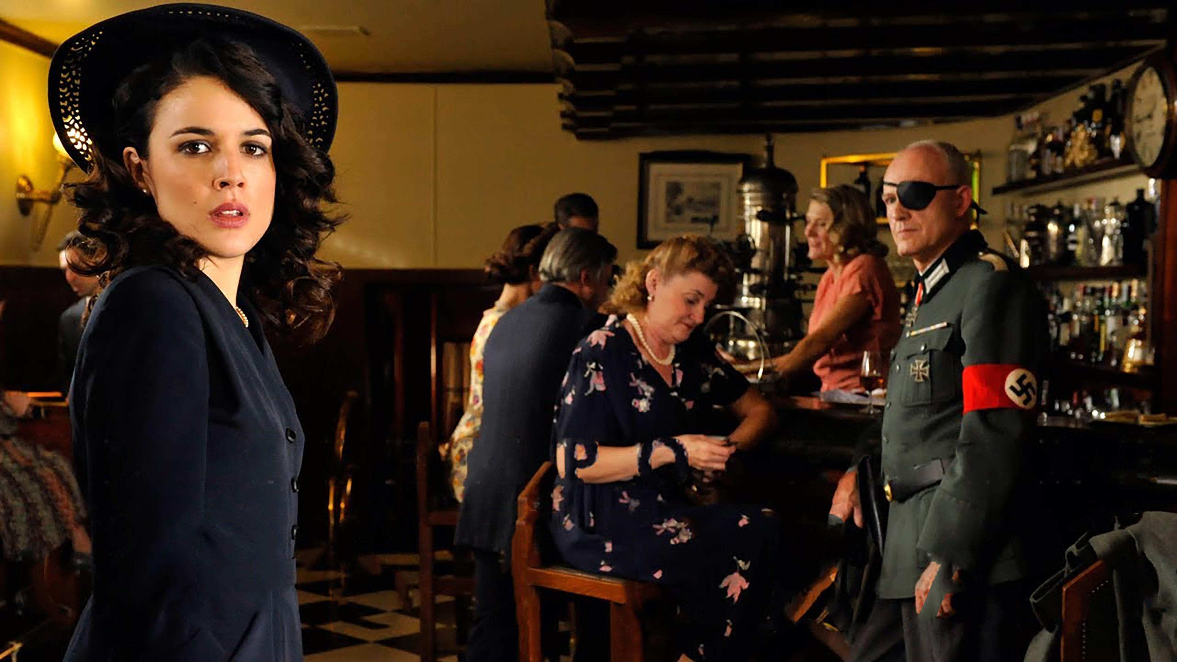 El tiempo entre costuras Background