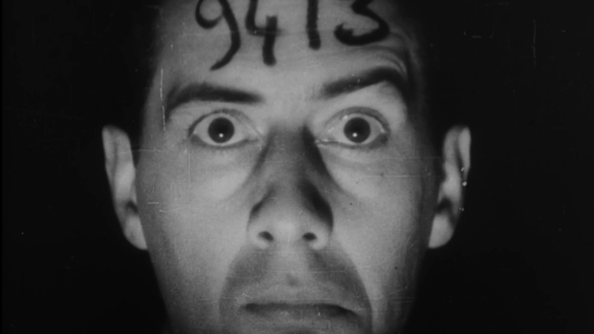 The Life and Death of 9413: A Hollywood Extra Background