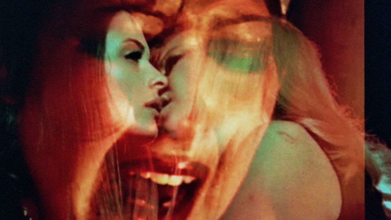 Blood Orgy of the She-Devils Background