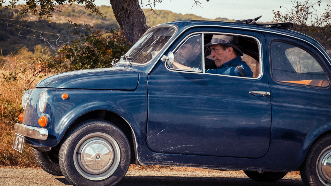 The Man in the Hat Background