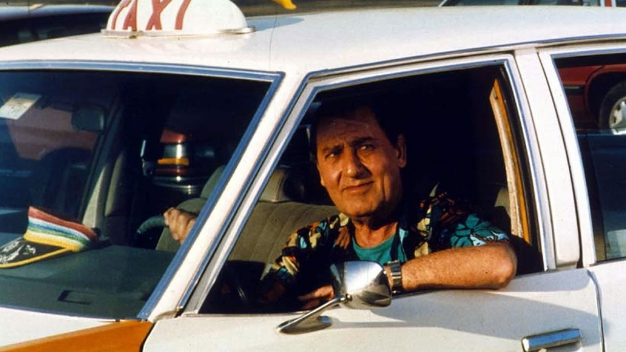 A Taxi Driver in New York Background