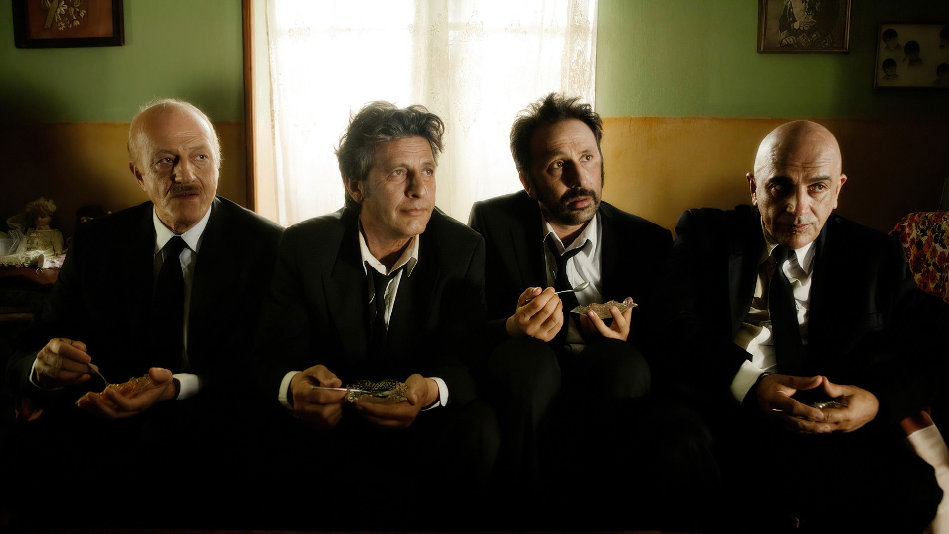 4 Black Suits Background