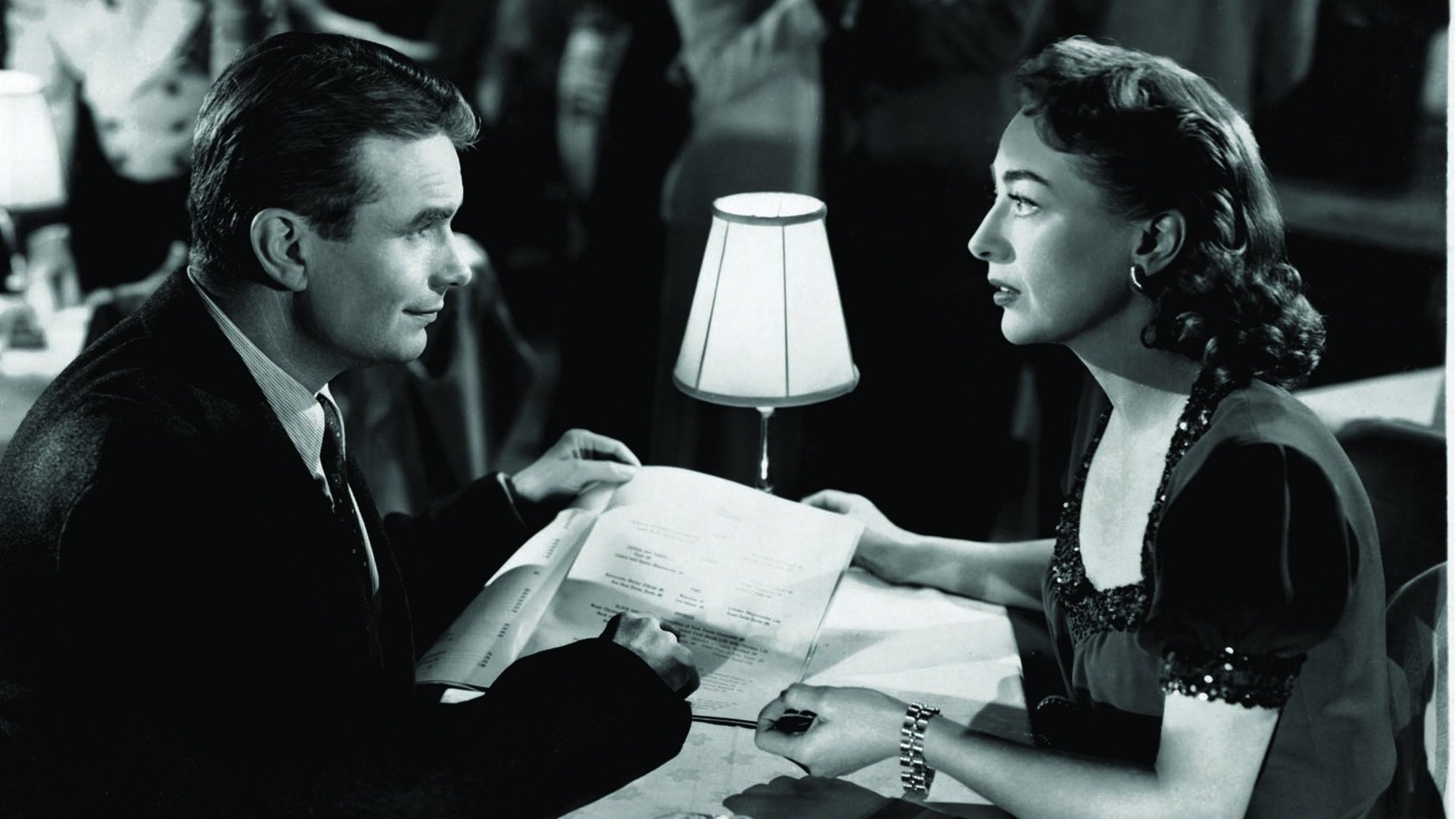 The Damned Don't Cry Background