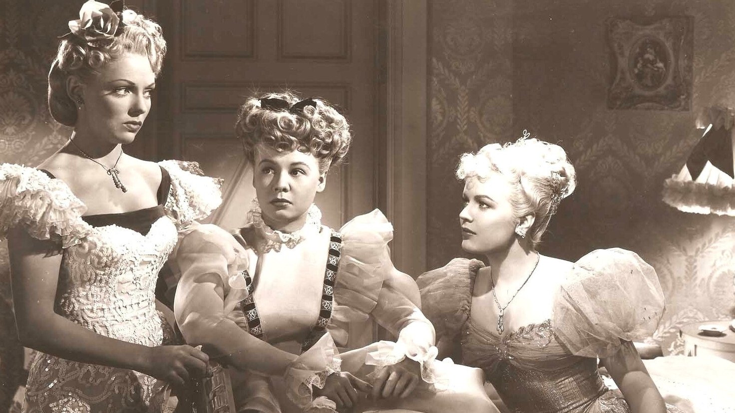 Three Little Girls in Blue Background