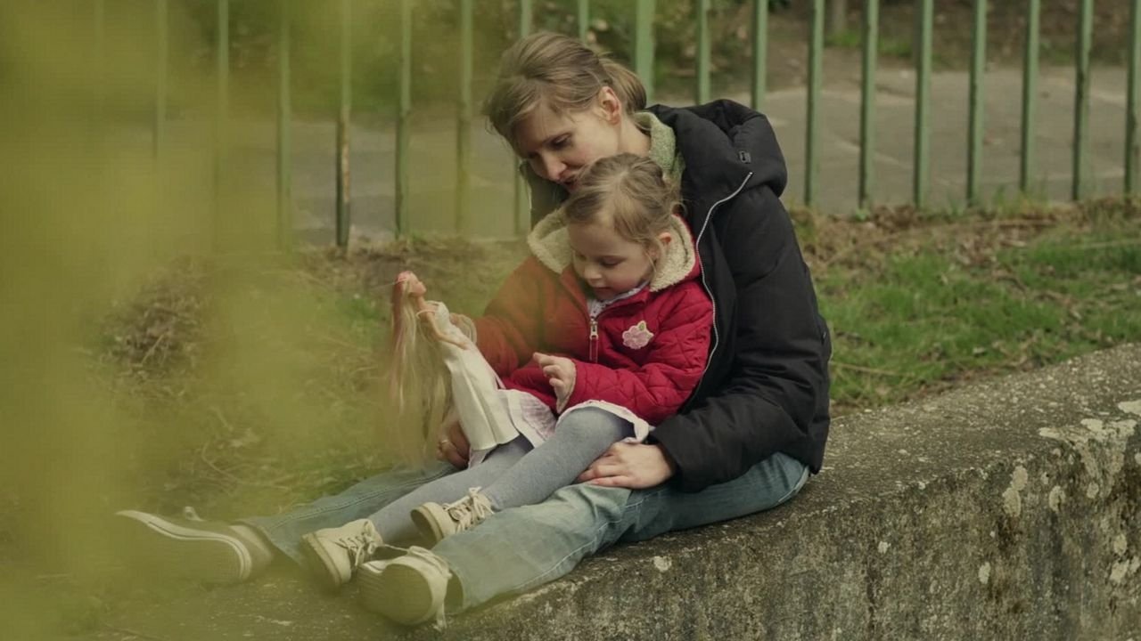 The Policeman's Wife Background